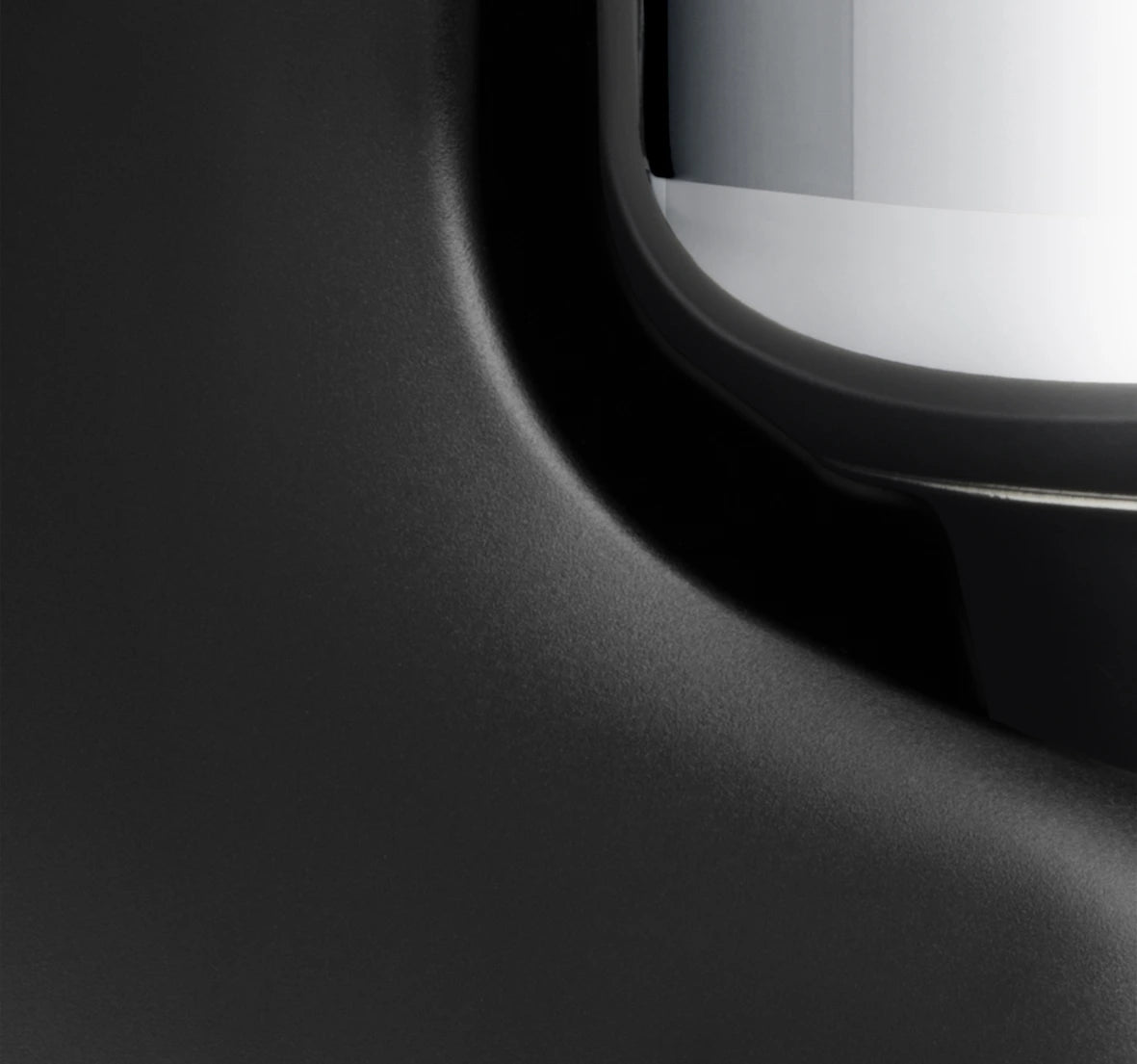Close-up view of the Ankarsrum Assistent Original Stand Mixer in black (akm-6230-b, matte-finish), highlighting its premium build, powerful motor, and unique mixing bowl design for efficient dough kneading.