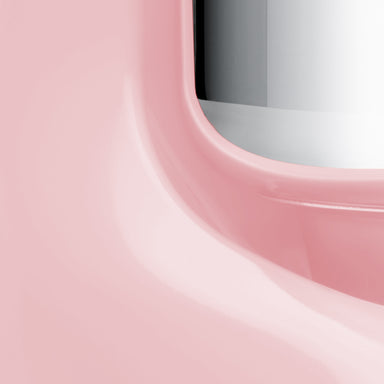 Close-up view of the Ankarsrum Assistent Original Stand Mixer in Cloudy Pink (akm-6230-cp, gloss-finish), highlighting its premium build, powerful motor, and unique mixing bowl design for efficient dough kneading.