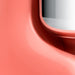 Close-up view of the Ankarsrum Assistent Original Stand Mixer in coral-crush (akm-6230-cc, gloss-finish), highlighting its premium build, powerful motor, and unique mixing bowl design for efficient dough kneading.