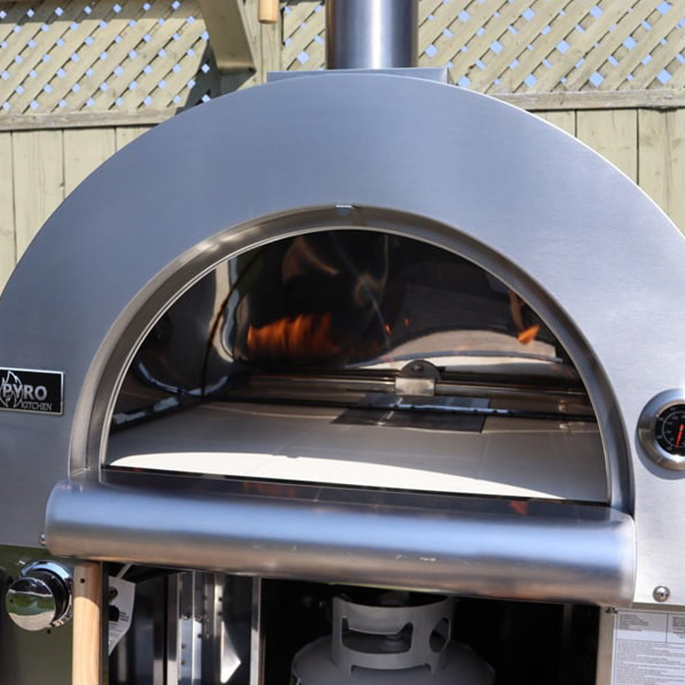 Interior view of the Pyro Kitchen Caldo V2 Hybrid Pizza Oven showing its double-wall insulated dome for superior heat retention and porcelain enamel finish for weather resistance.