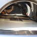 Interior view of the Pyro Kitchen Caldo V2 Hybrid Pizza Oven with logs, showing its double-wall insulated dome and spacious 25 x 29.5-inch cooking surface.